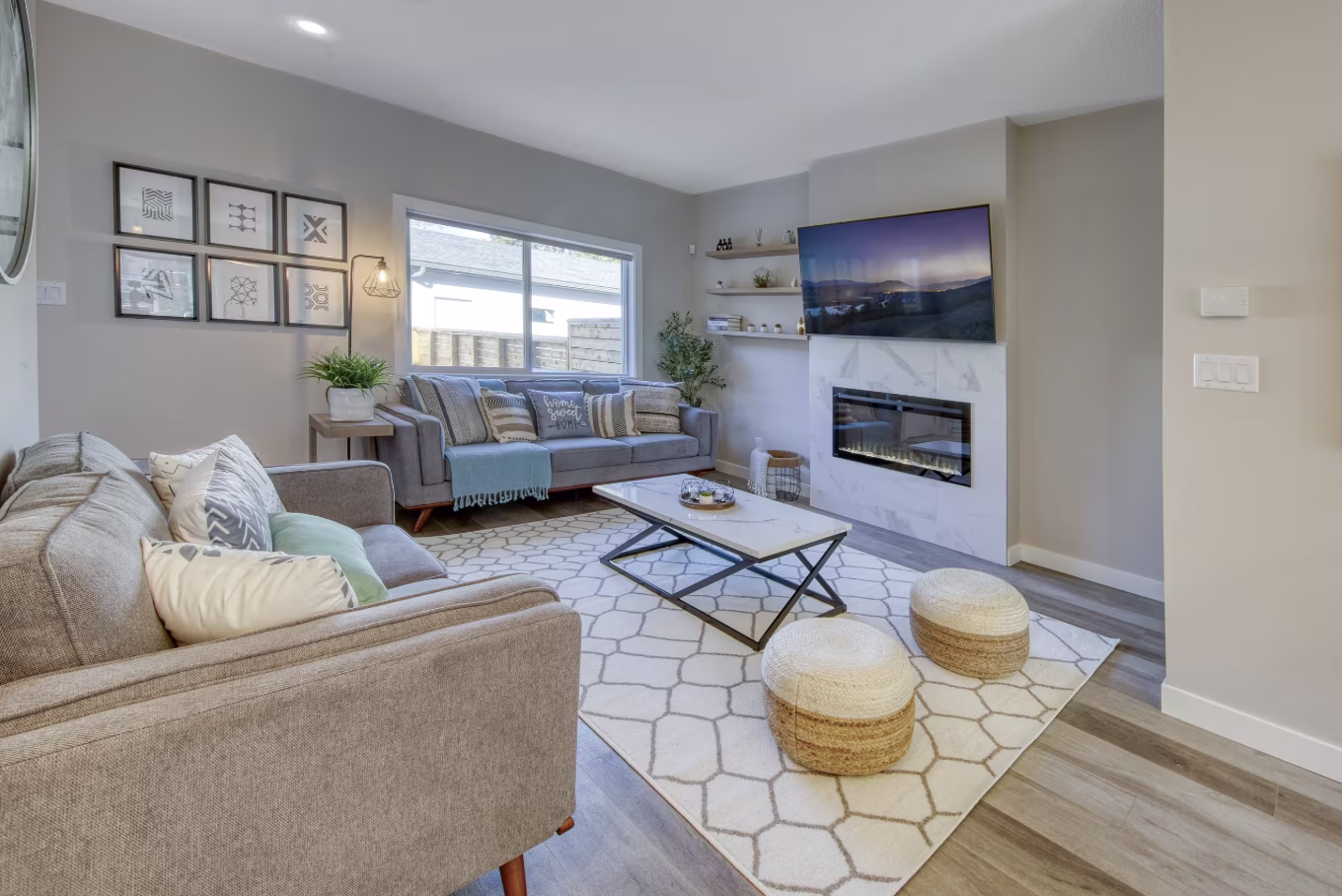Living room and fireplace at a client mountain retreat in Radium, British Columbia